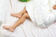 Sleeping woman legs