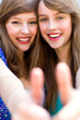 Girls with thumbs up