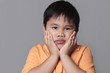 asian kid very sad