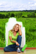 woman paint green field on the wall