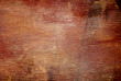 Dark brown old weathered leather.