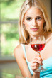Young happy smiling woman with glass of red wine Young happy smiling woman with glass of red wine