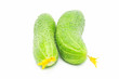 fresh green cucumbers isolated over white