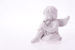 Porcelain angel playing trumpet Porcelain angel playing trumpet