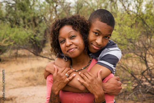 Photo: Happy African-American family outside Happy African-American family outside