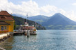 boat leaving vitznau on the lake lucine