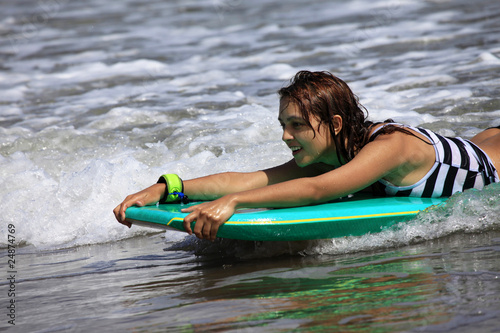 Photo: surfer - woman surfer - woman