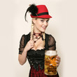 bayrisches Madl im Dirndl mit Bier
