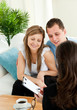 Bright couple concluding a car contract with a female dealer Bright couple concluding a car contract with a female dealer