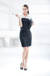 An attractive businesswoman holding pen