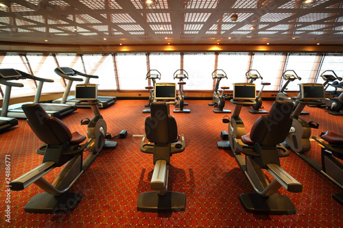 Photo: gym hall with exercise bicycle in cruise ship view gym hall with exercise bicycle in cruise ship view