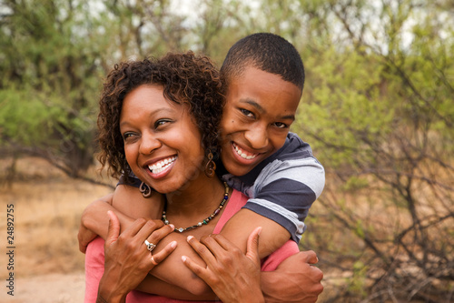Photo: Happy African-American family outside Happy African-American family outside