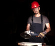 manual worker with grinder