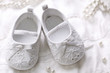 Baby girl shoes on white background