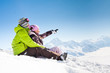 Photo: Young happy couple in winter mountains Young happy couple in winter mountains