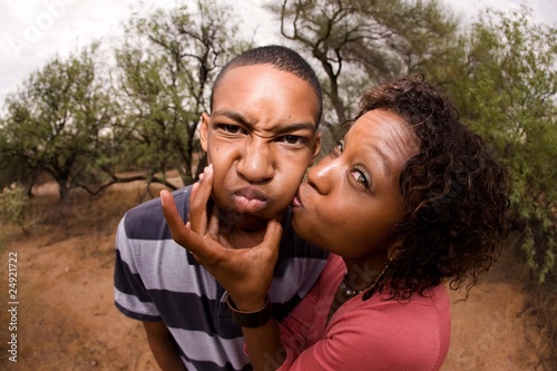 Photo: African-American family making faces African-American family making faces