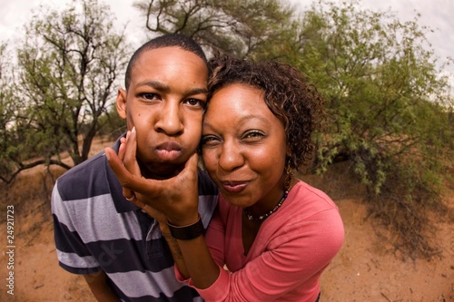 Photo: African-American family making faces African-American family making faces
