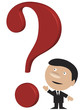 Business man standing in front of big red question mark