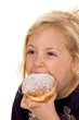 Kind im Fasching mit Krapfen. Faschingskrapfen