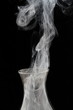 Smoke leaving an extinct old lamp Smoke leaving an extinct old lamp