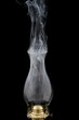 Smoke leaving an extinct old lamp Smoke leaving an extinct old lamp