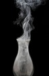 Smoke leaving an extinct old lamp Smoke leaving an extinct old lamp