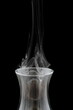 Smoke leaving an extinct old lamp Smoke leaving an extinct old lamp