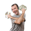 Photo: happy man listening music with cds in the hands happy man listening music with cds in the hands