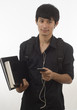 Teenager with music player