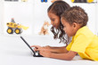 Photo: african american kids using laptop african american kids using laptop
