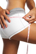perfect womans bum  measure  by metre-stick