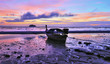 Longtail boat on the beach of Lipe island at dawn, Thailand