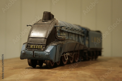 Photo: Replica Model Train on a Wooden Table Replica Model Train on a Wooden Table