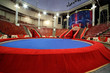 blue circle arena and columns in circus white lamps turned on