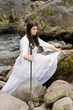 Young girl in white dress with two handed sword Young girl in white dress with two handed sword
