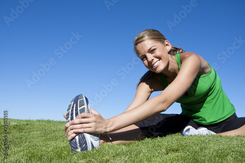 Photo: Attractive Woman stretching before Fitness and Exercise Attractive Woman stretching before Fitness and Exercise