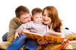 Parents reading to their kid