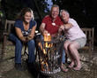 Family at campfire in the garden