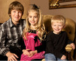Formal portrait of three children