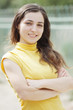 Young woman arms folded