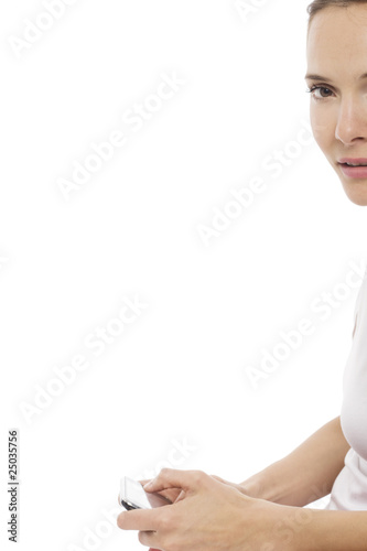 Photo: young woman with smart phone on white background studio young woman with smart phone on white background studio