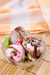 Glass cup with sweet ice cream on wooden table top