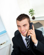 Sophisticated young businessman talking on phone