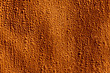 Red protective building material made of paper fibers