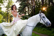 Horse riding wedding woman at sunset