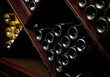 Snapshot of the wine cellar. The bottles on wooden shelves. Snapshot of the wine cellar. The bottles on wooden shelves.