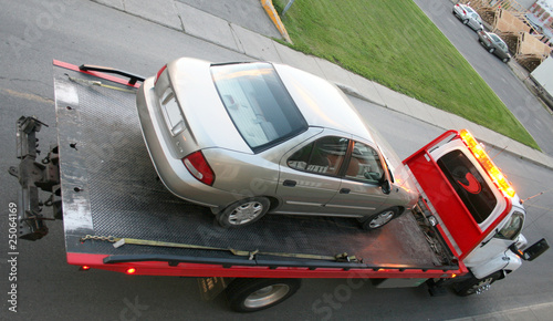 Photo: Car on a flatbed truck Car on a flatbed truck
