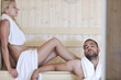 happy young couple in sauna