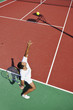 young man play tennis outdoor