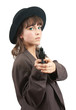 beautiful young woman posing naked with a handgun